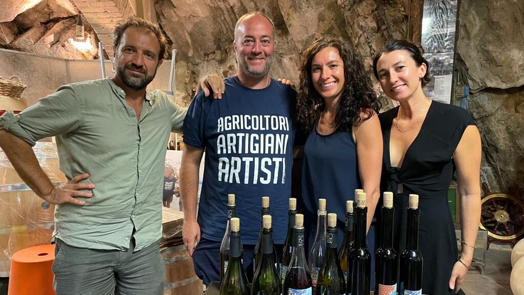 Photo of Possa and the founders of the Roscioli Italian Wine Club at his winery in Cinque Terre