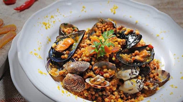 Fregula with clams and bottarga